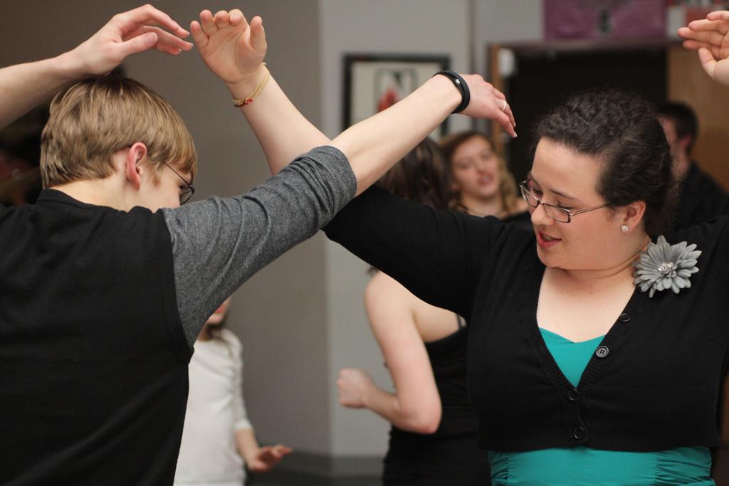 2011 graduates Steven Roemer (left) and Bethany Harris (right) swing dancing at the 8 annual spring swing.