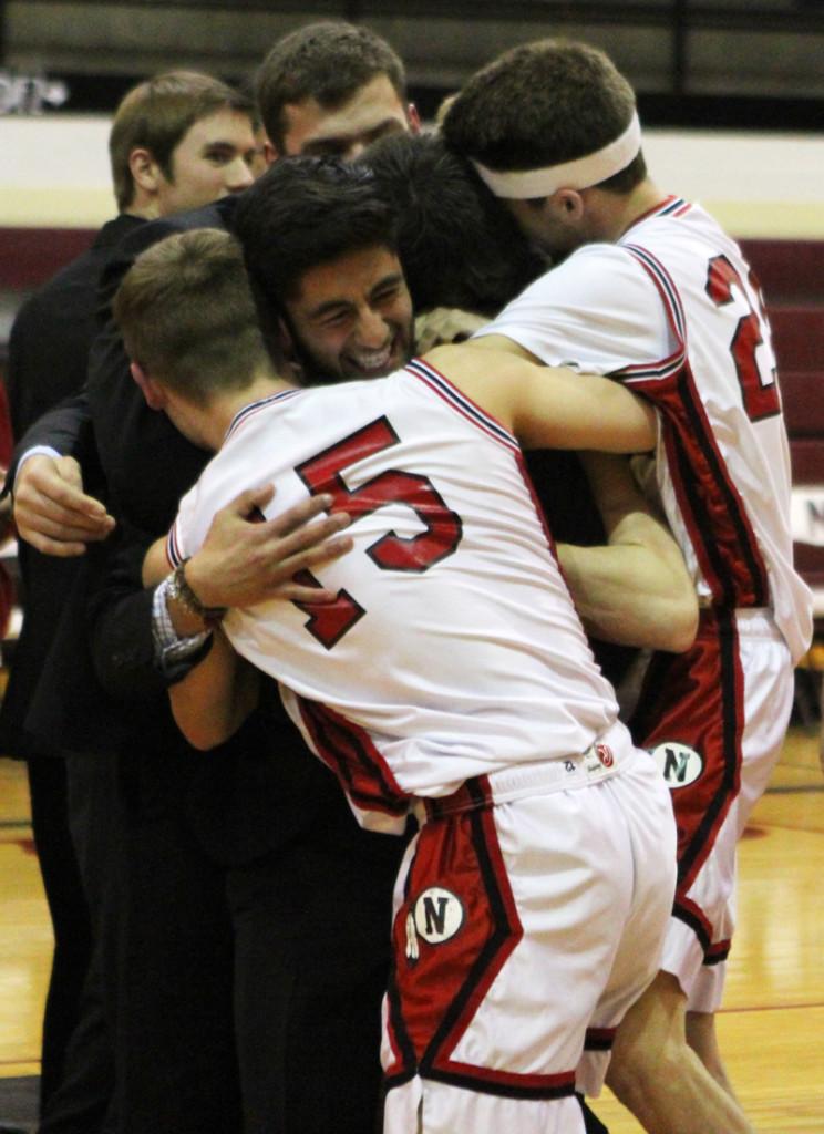 After being announced as Northman senior Mario Garcia is hugged by seniors Ben Burchstead and Nathan Hauber.