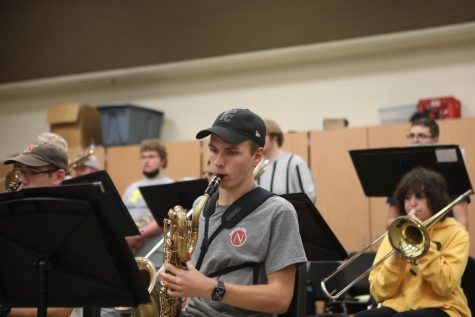 Playing during rehearsal, junior James Barton prepares for the Spring Swing jazz concert. “I’m super excited for next year,” Barton said. “Most of the people in the jazz band are seniors. I’m ready to see new faces in class next year.”